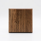 Handmade spotted gum hardwood coaster, top view showing chamfered edge and grain