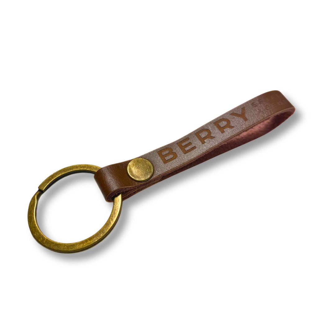 Personalised leather keyring engraved with a real estate agency logo