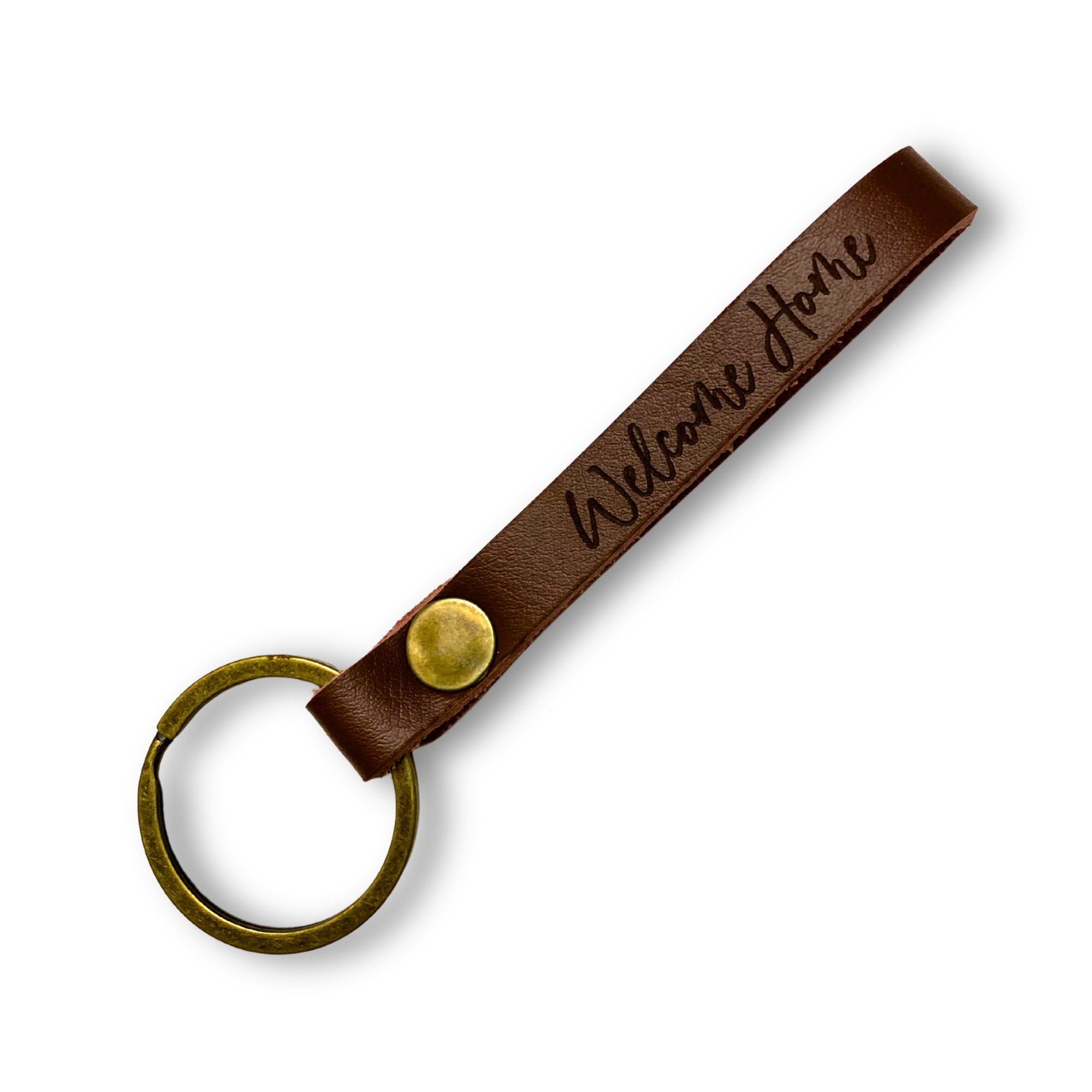 Personalised leather keyring engraved with 'Welcome Home', on a white background
