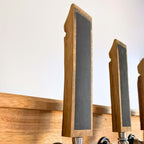 Barrel stave beer tap handle fitted to a home bar tap, side view