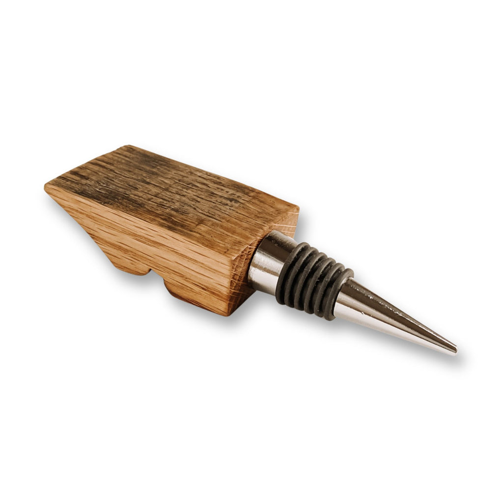 Barrel stave wine bottle stopper, left side view on white background